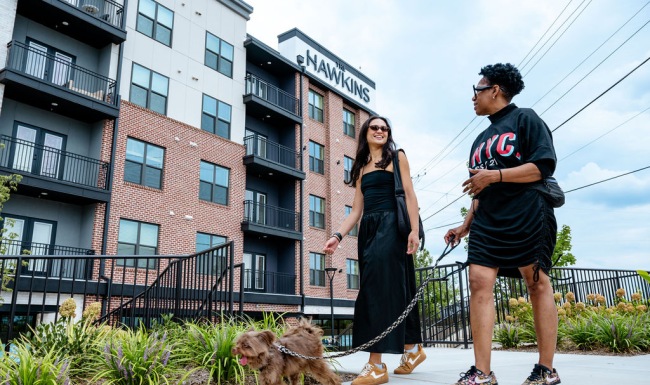 Residents walking in Chamblee outside of The Hawkins Residents walking in Chamblee outside of The Hawkins