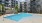 Resort-style swimming pool with sundeck at The Hawkins luxury apartments in Chamblee